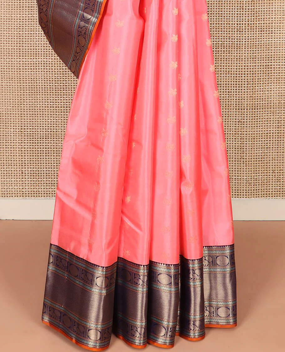 Pink Vasundhara Silk Saree Bedecked with Zari Buttas, Highlighted with a Contrast Border of Rekku, Muthu, Neli, and Mayil Poun Designs, Zari Gleamed Up Pallu of Ogee Patterns, and Paired with a Contrast Blouse - Image 4