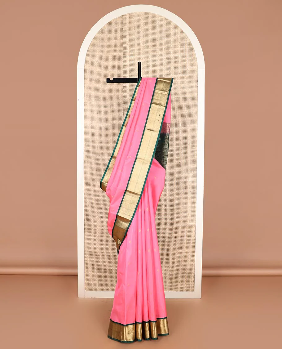 Pink zari buttas Vasundhara silk saree, contrast border of salngai, kathir, and mayil kann designs, and jaal pallu
