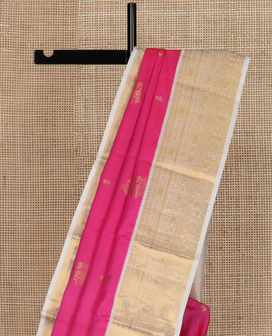 Pink zari buttas Vasundhara silk saree, contrast border of thilakam, diamond, laddu kamalam, muthu, kathir, mayil and chakram designs, and jaal pallu - Image 4