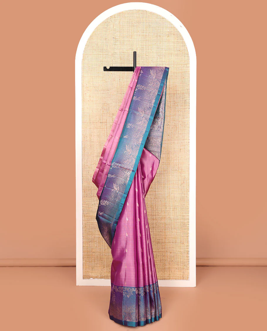 Pink zari buttas Mayuri soft silk saree, contrast pond-theme zari woven border of floral and swan motifs, and intricate pallu