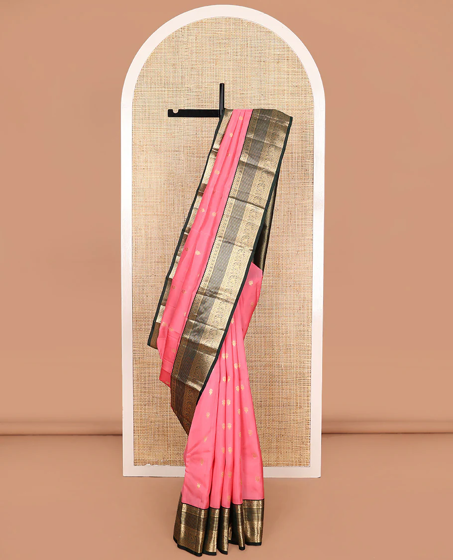 Pink zari buttas Vasundhara Lite Silk Mix Saree, contrast border of manga, muthu, kamalam, diamond, and mayil designs, and pallu of leaf vine