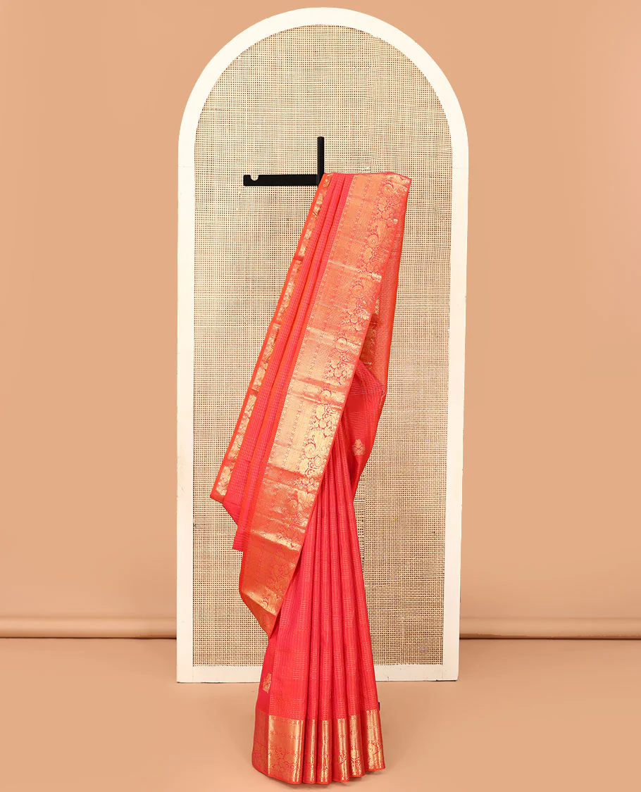 Pink zari checked Kanchipuram silk saree, zari border of rekku, poun, kamalam, kuyil kann, and mayil designs, and jaal pallu