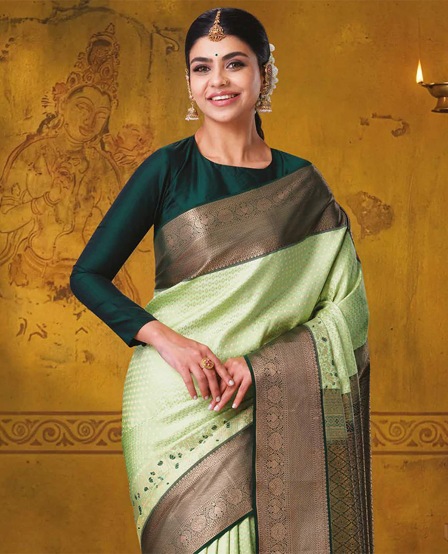 Pista green jacquard kanchipuram wedding silk saree, contrast traditional zari design border, and zari-rich jaal pallu - Image 2