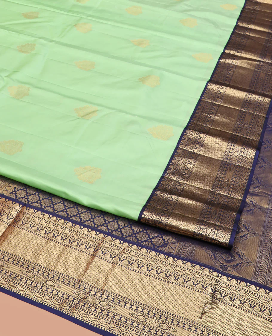 Pistachio Green Vasundhara Silk Saree Elegantly Embellished with Zari Buttas, Complemented with a Contrast Border Featuring Thilakam and Mayil Kann Designs, Majestically Detailed Pallu of Intricate Designs, and Paired with a Contrast Blouse - Image 2