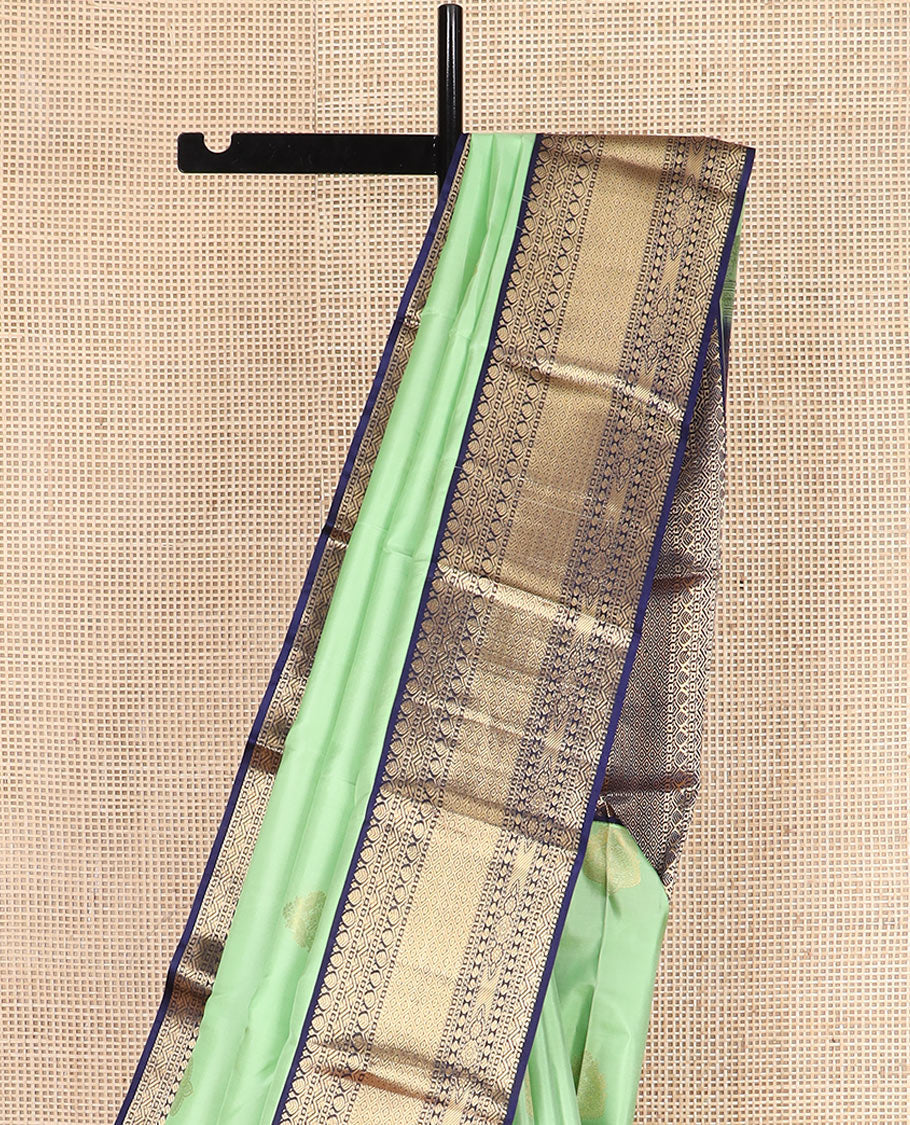 Pistachio Green Vasundhara Silk Saree Elegantly Embellished with Zari Buttas, Complemented with a Contrast Border Featuring Thilakam and Mayil Kann Designs, Majestically Detailed Pallu of Intricate Designs, and Paired with a Contrast Blouse - Image 3