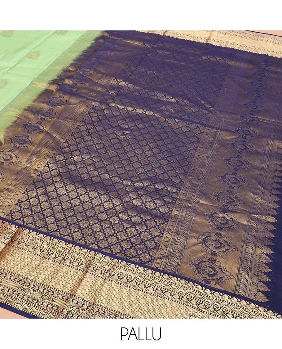 Pistachio Green Vasundhara Silk Saree Elegantly Embellished with Zari Buttas, Complemented with a Contrast Border Featuring Thilakam and Mayil Kann Designs, Majestically Detailed Pallu of Intricate Designs, and Paired with a Contrast Blouse - Image 5
