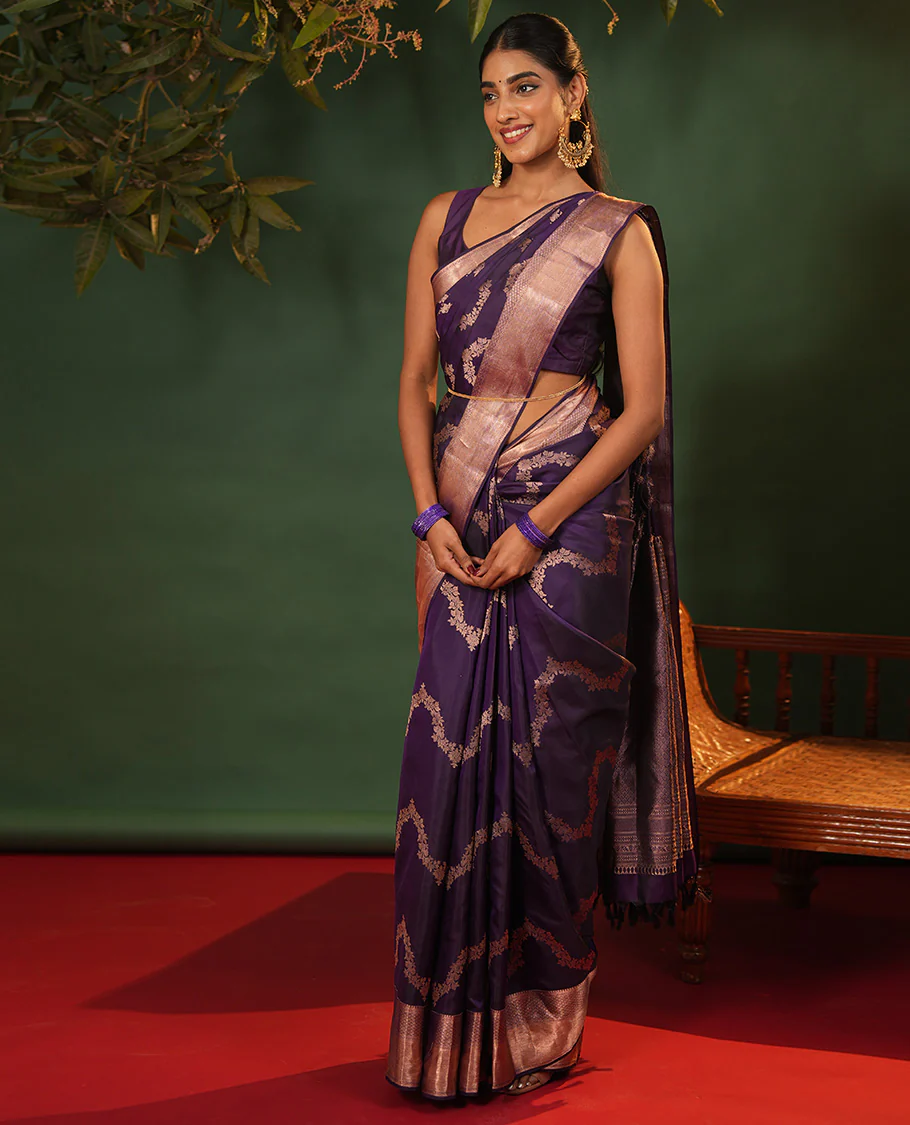 Purple floral jaal jacquard Vasundhara silk saree, zari border of thilakam mokku, lavangam, and jaal designs, intricate pallu, and zari design blouse