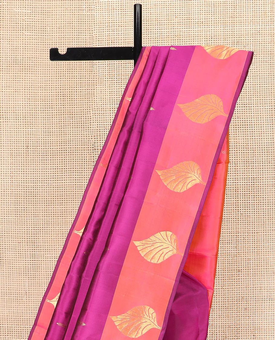 Purple Kanchipuram Silk Saree Featuring All-Over Zari Buttas, Highlighted by a Contrast Border with Leaf Zari Buttas, and a Pallu Adorned with Floral Motifs, Paired with a Subtle Contrast Plain Blouse - Image 3