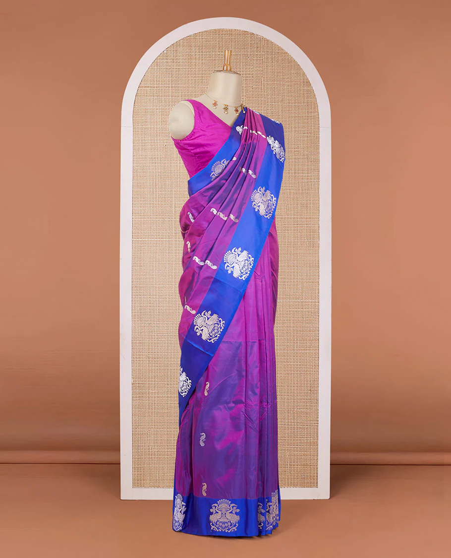 Purple katan silk saree with zari peacock buttas, contrast peacock design zari border & pallu of zari geometric designs