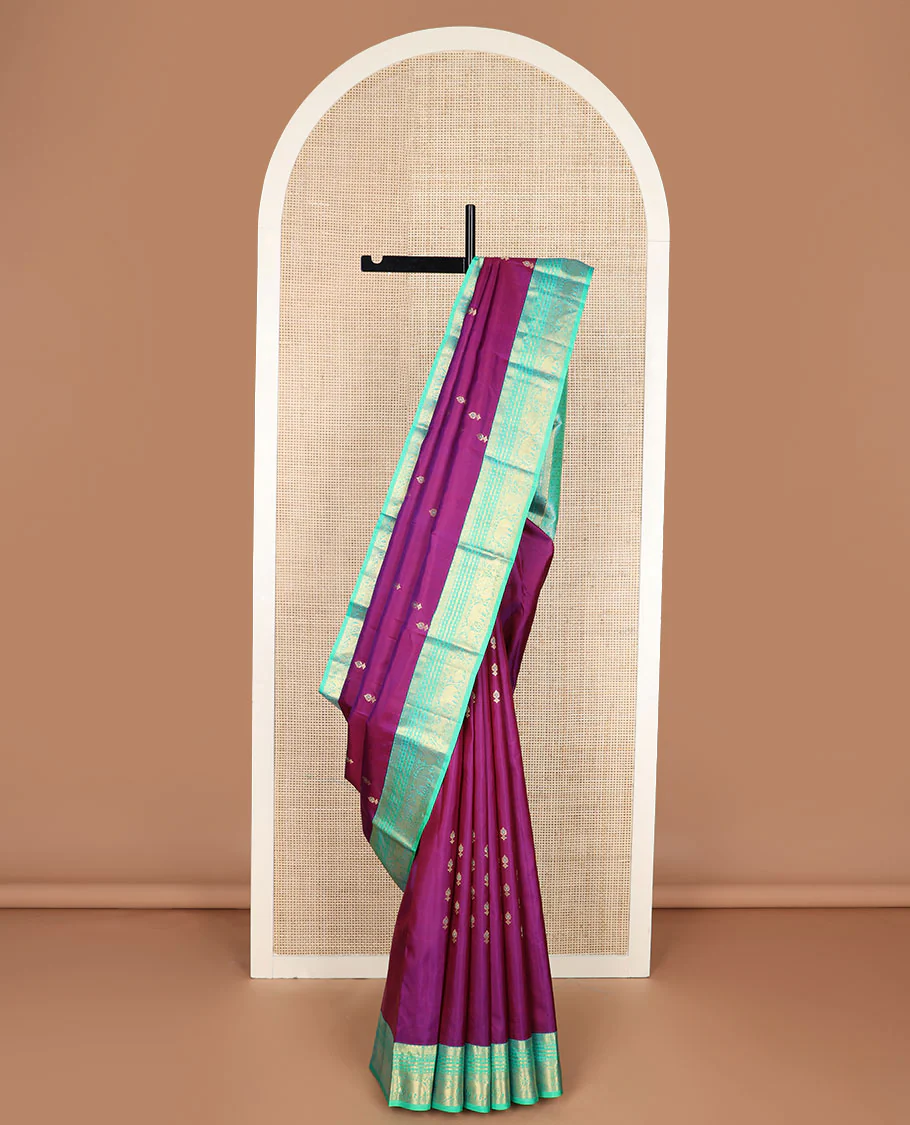 Purple meena zari buttas Vasundhara silk saree, contrast border of yaali,yaanai & mayil & pallu of jaal designs