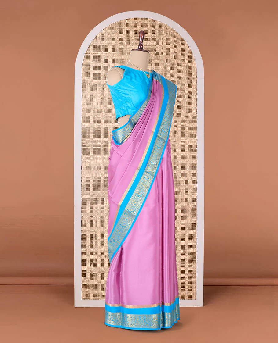 Purple plain Mysore silk saree, contrast rettai pettu peacock motifs zari border, and pallu of jaal design