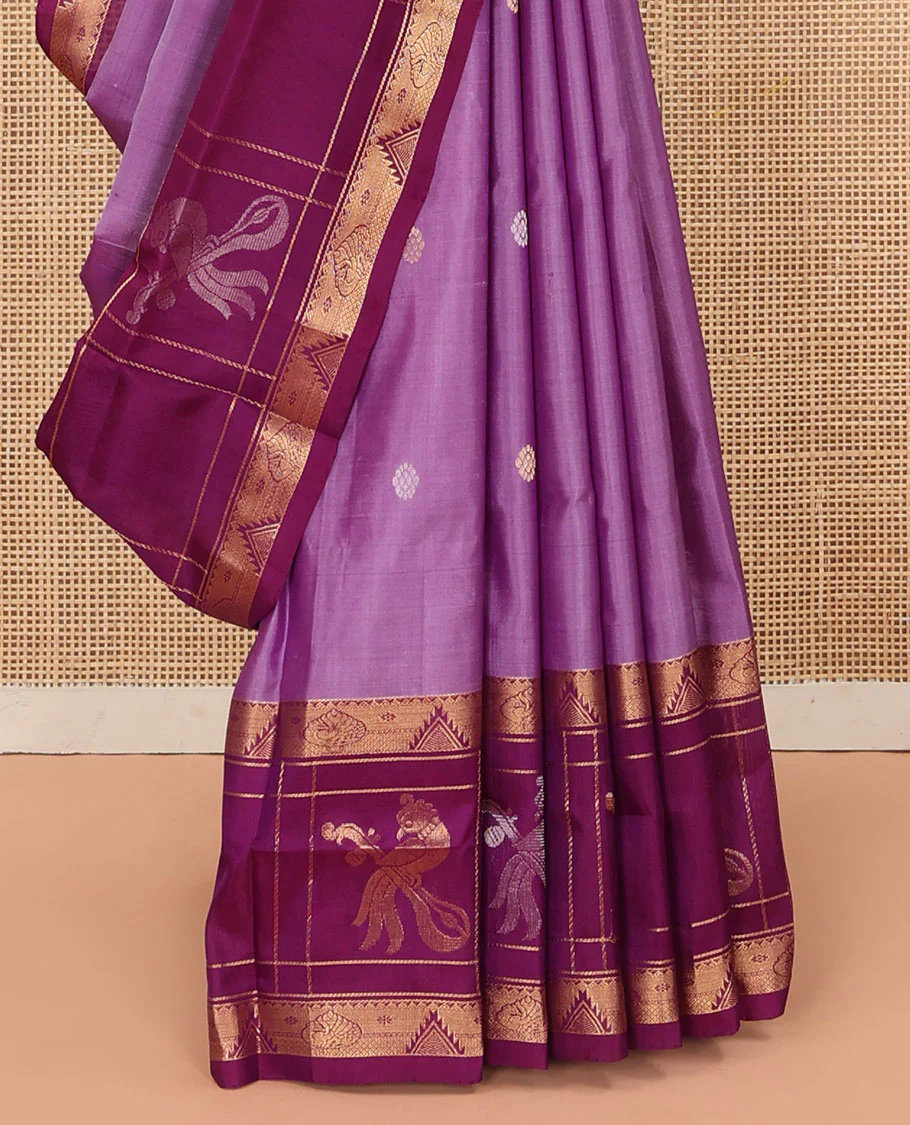 Purple Uppada Silk Saree Elevated with Floral Buttas, Captivating Contrast Border of Traditional Zari Motifs and Peacock Motifs, Pallu Depicting Floral Jaal Design, and Paired with a Contrast Zari-Bordered Blouse - Image 4