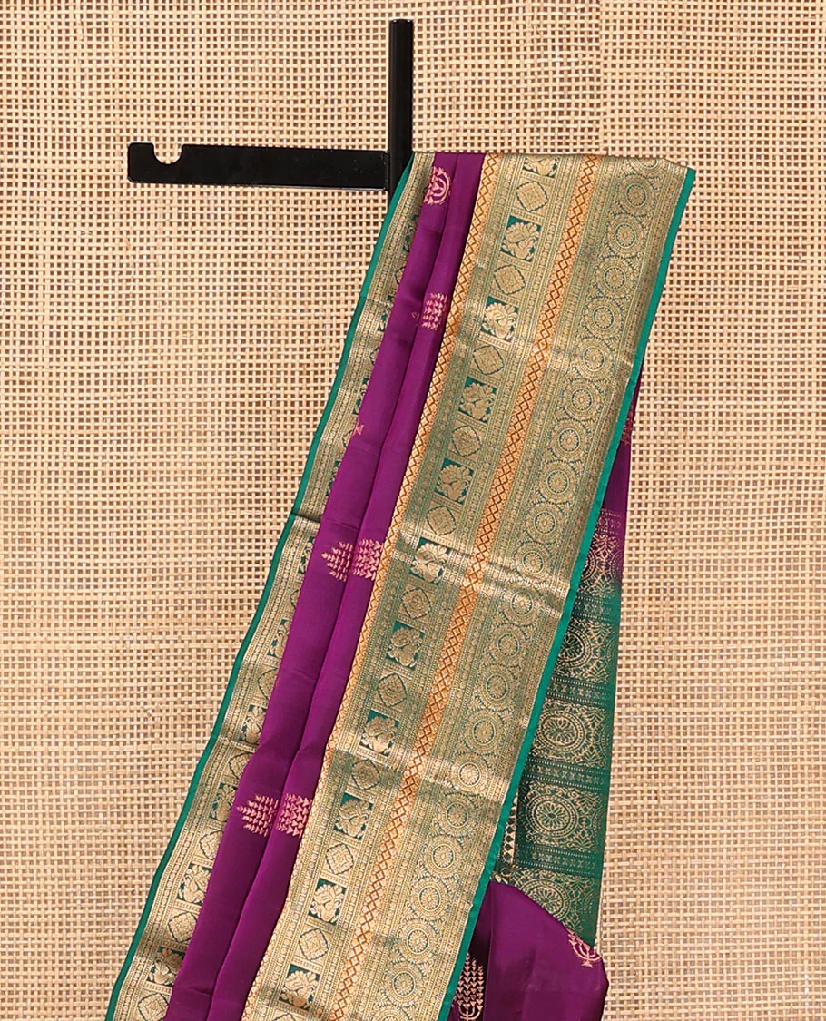 Purple Vasundhara Lite Silk Mix Saree Featuring Layered Deepam Buttas, Complemented by a Contrast Border of Thilakam Mokku, Muthu, Rudraksham, Lavangam, Laddu Kamalam, and Chakram Designs, Pallu Steeped with Chakram Designs, and a Contrast Blouse - Image 3