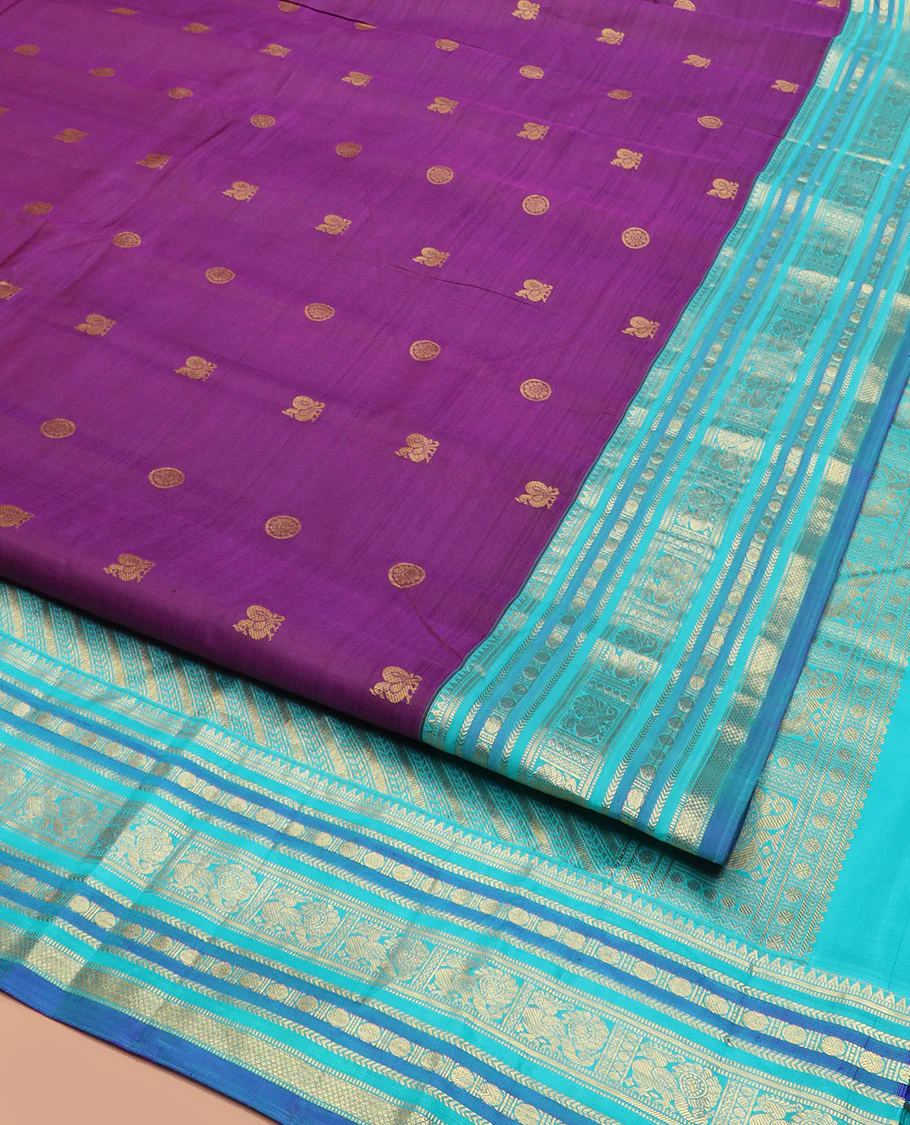 Purple Vasundhara Silk Saree Detailed with Mayil Chakram Buttas, Complemented by a Contrast Varisai Pettu Border of Rekku, Muthu, Kathir, Rudraksham, Mayil, and Mayil Kann Designs, Gleaming Pallu of Diagonal Stripes, and Paired with a Contrast Blouse - Image 2
