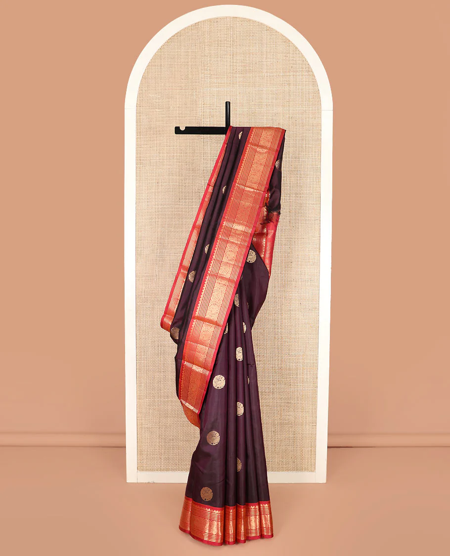 Purple Vasundhara Silk Saree Enthralled with Round Mayil Buttas, Highlighted with a Contrast Border of Thilakam Mokku, Kathir, Banaras, and Mayil Designs, Pallu Decorated with Jaal Design, and Paired with a Contrast Blouse