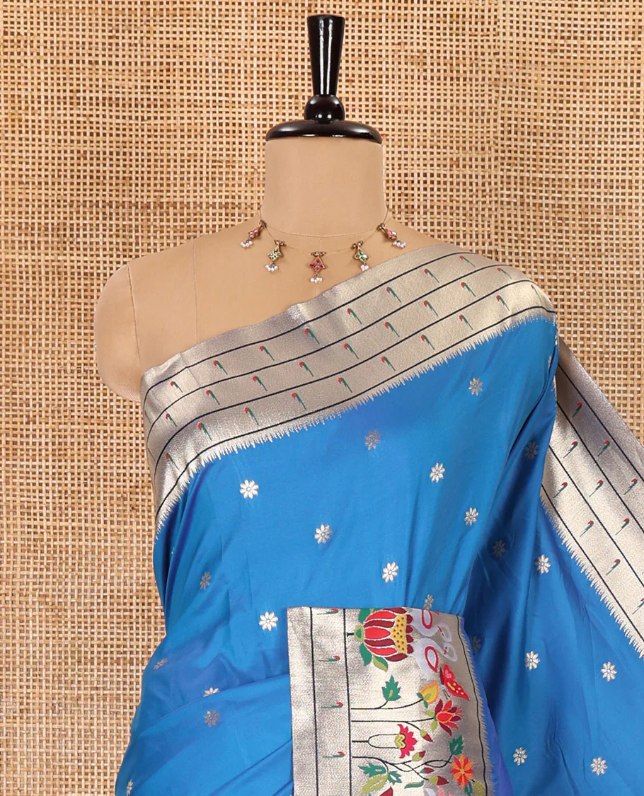 Rama blue floral buttas art silk paithani saree, contrast floral, bird, and muniya border, pallu of floral and bird designs and a matching blouse - Image 2