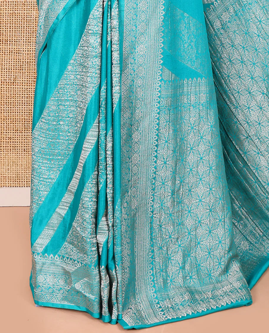 Rama green geometric and intricate designs zari woven fancy crepe saree, traditional zari border, floral-star gridded pallu, and a matching blouse - Image 3