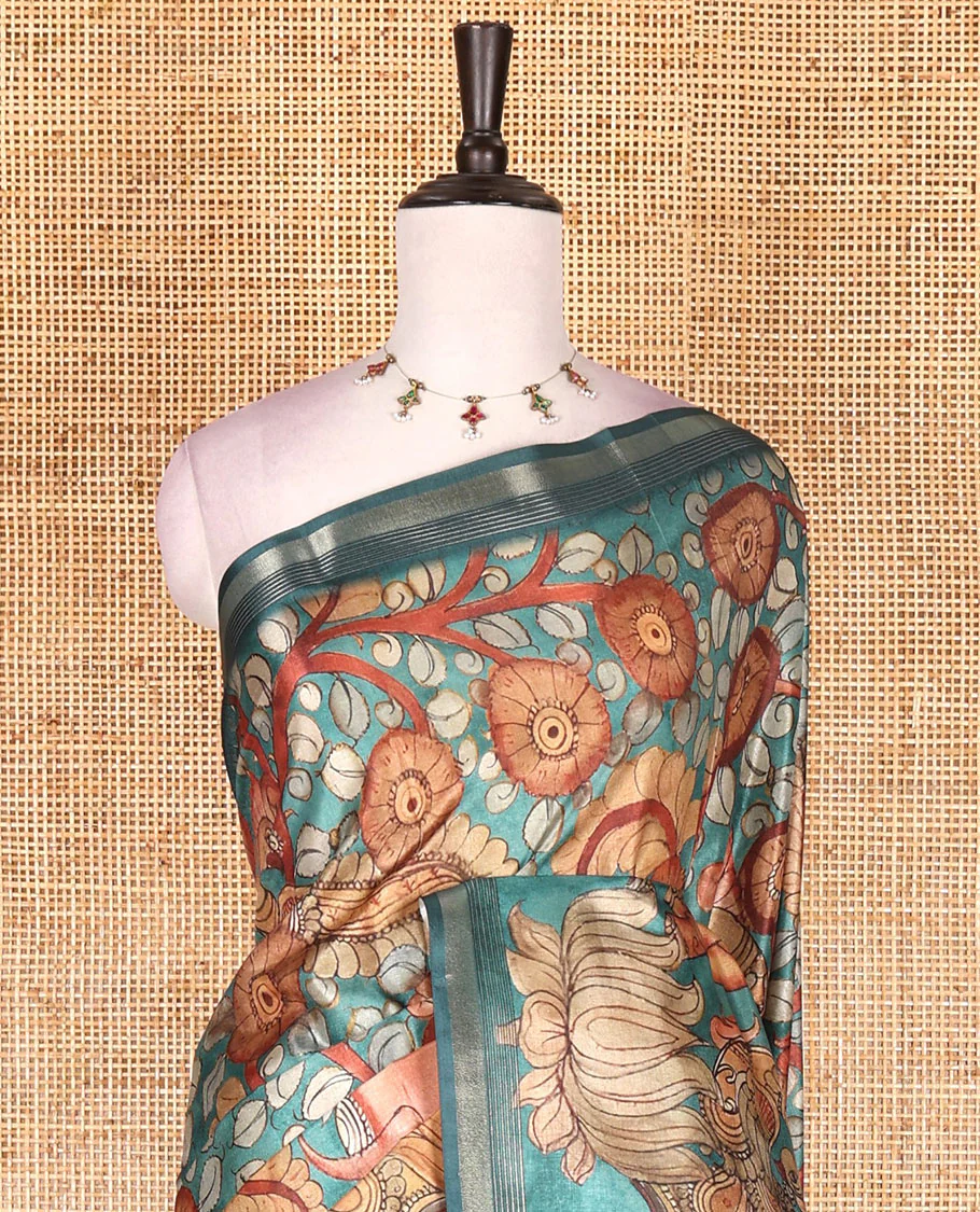 Rama green kalamkari elephant, peacock, and floral printed semi-tussar saree, zari piping border, kalamkari motifs printed pallu, and contrast printed blouse - Image 3