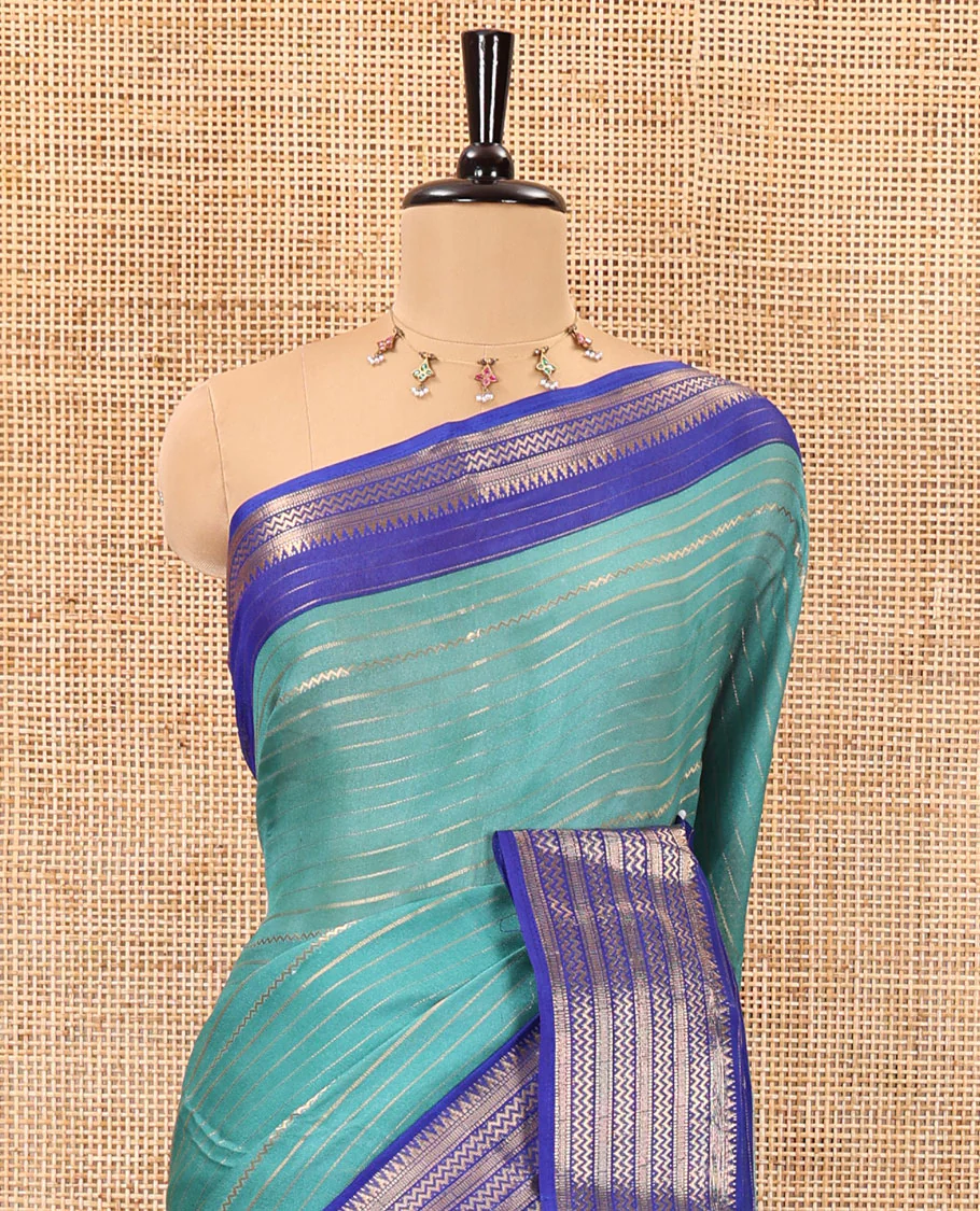 Rama horizontal zari striped moss chiffon saree, contrast traditional zari border, striped pallu, and a contrast zari design blouse - Image 3