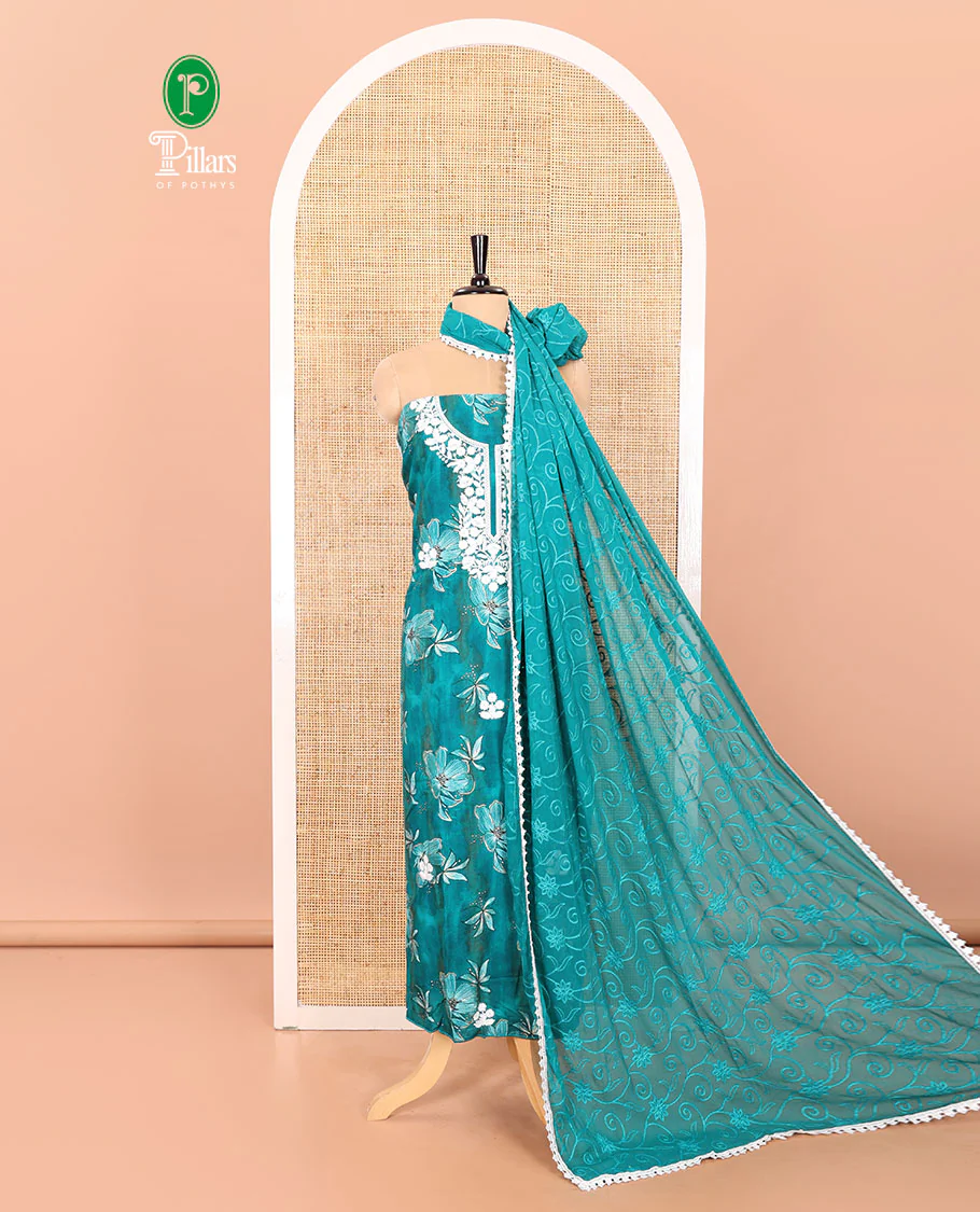 Rama Material Chudidar Set Accentuated with Phulkari-Style Floral Embroidery and Floral Print Rayon Top, Subtly Made Plain Rayon Bottom, and a Chiffon Georgette Dupatta of Floral Theme Designs