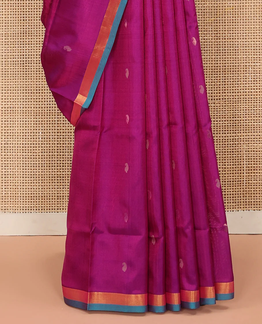 Rani Pink Uppada Silk Saree Beautified with Paisley Buttas, Captivating Contrast Bavanji Border, Pallu Featuring Floral and Paisley Design, and Paired with a Matching Blouse - Image 4