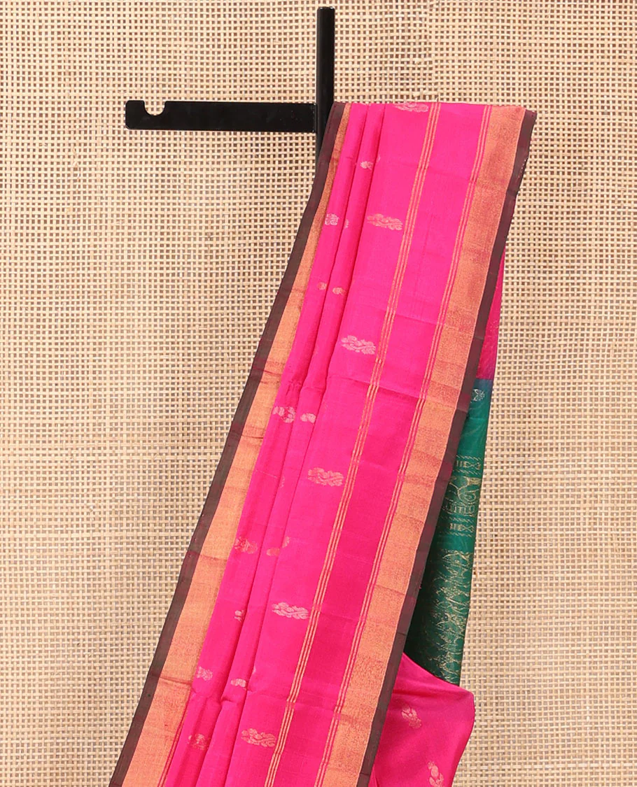 Rani Pink Uppada Silk Saree Elegantly Highlighted with Zari Buttas, Subtle Zari Border, Complemented by a Pallu of Peacock and Paisley Designs, and Paired with a Contrast Blouse - Image 3