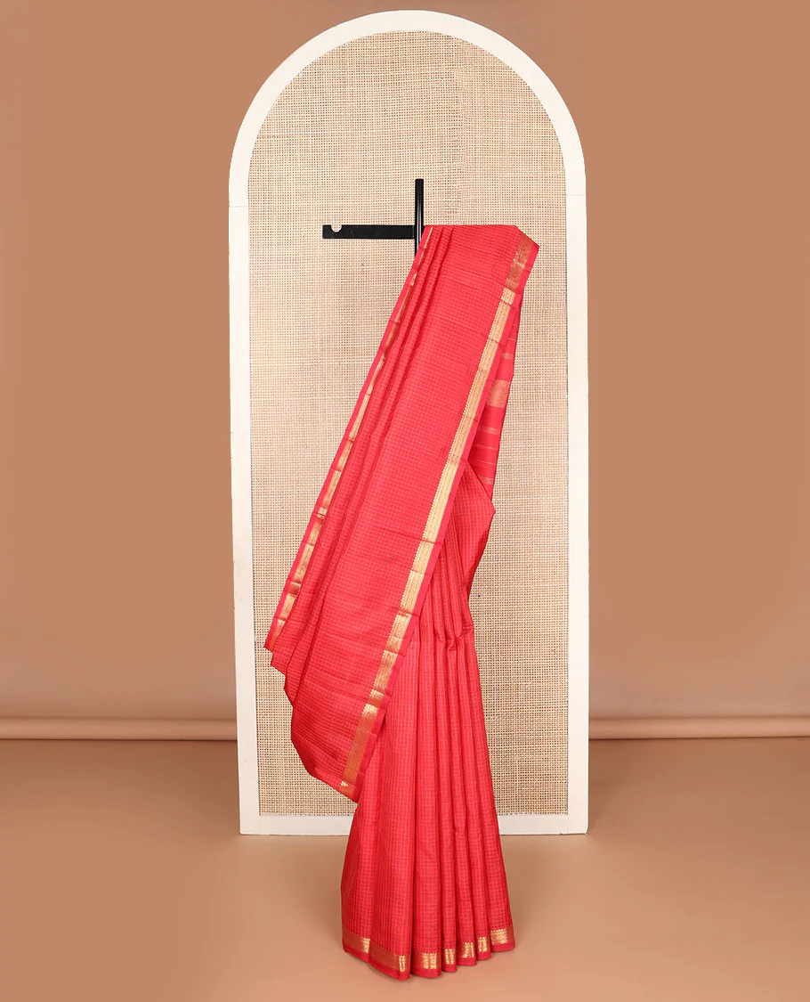 Red checked Kanchipuram silk saree, self-border of thilakam mokku,muthu, diamond & chakram designs & seppu rekku pallu
