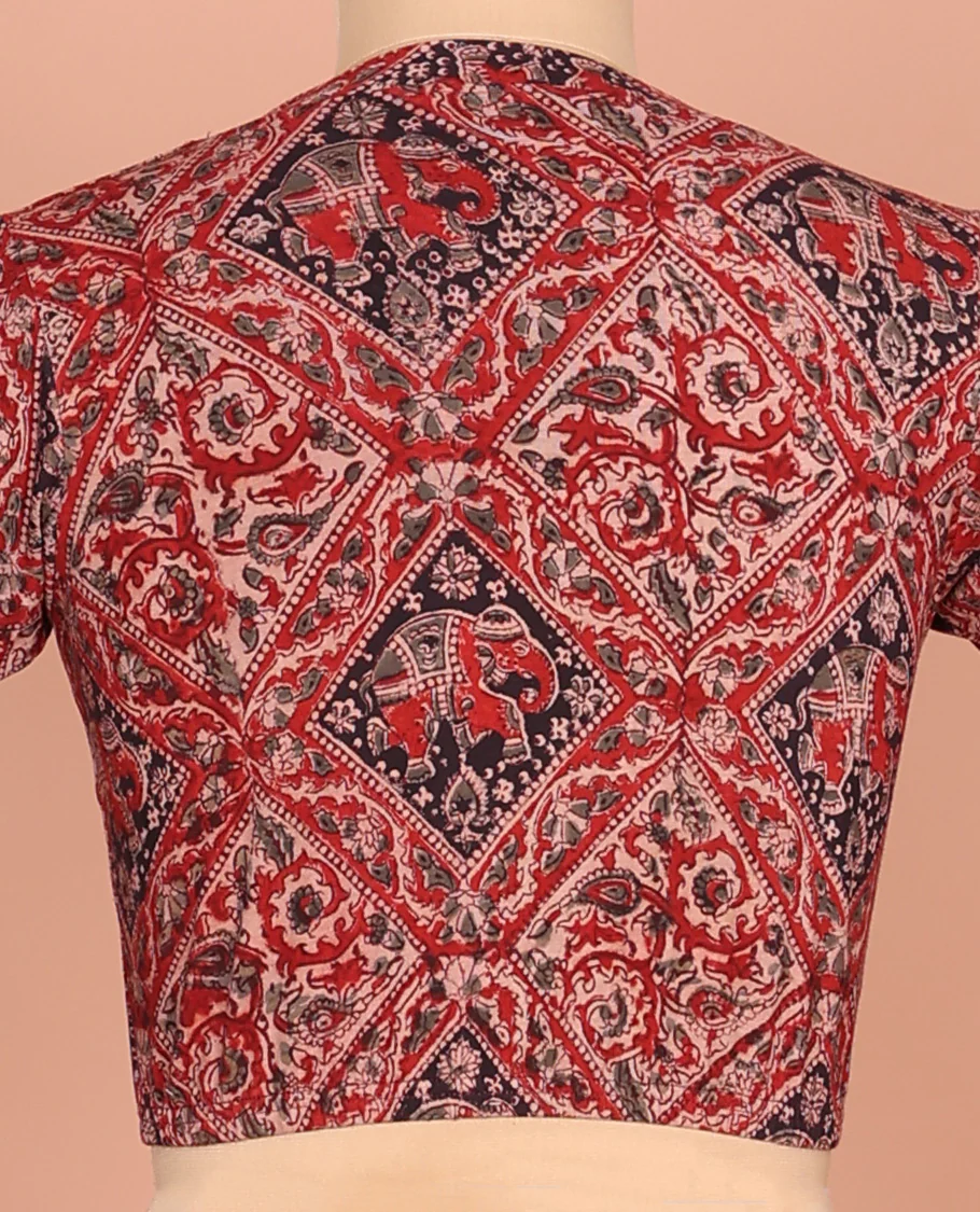 Red Cotton Readymade Blouse Adorned with All-Over Floral and Elephant Motifs Print, Featuring a Front Leaf-Neck, a Closed Back Neck, and Elbow Sleeves - Image 4