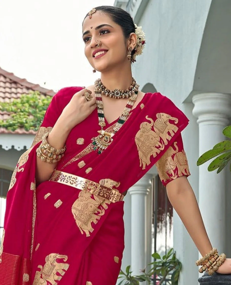 Red Designer Saree, Meticulously Crafted with Zari Buttas, Featuring a Self-Border Depicting a Herd of Elephants, Subtly Woven Pallu of Spare Stripes, and Paired with a Matching Blouse of Elephant Motifs - Image 2