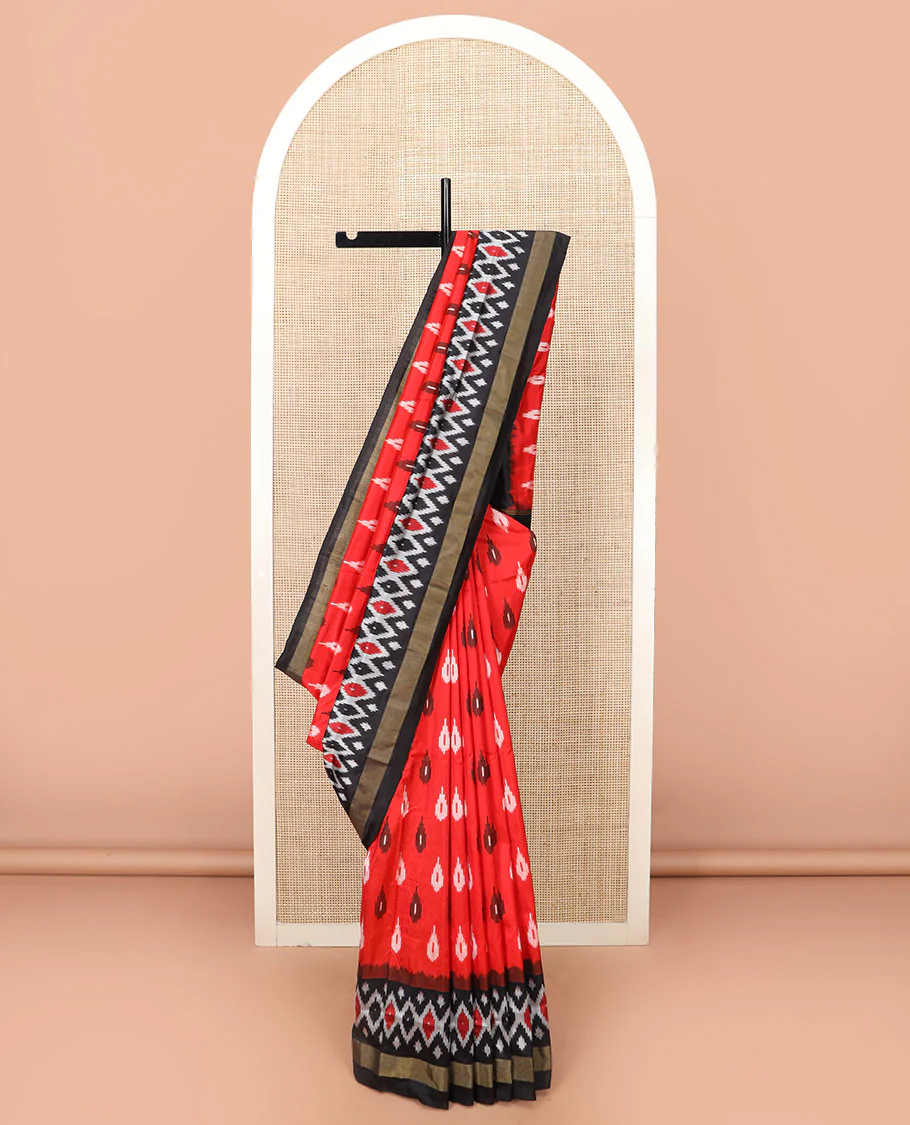 Red Ikkat Silk Saree Brightened with Ikkat Buttas, Complemented by a Contrast Ikkat Design Border, a Hazily Woven Pallu of Diamond Patterns, and a Contrast Blouse - Image 2