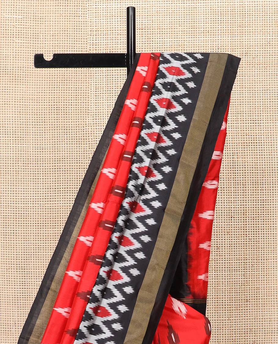 Red Ikkat Silk Saree Brightened with Ikkat Buttas, Complemented by a Contrast Ikkat Design Border, a Hazily Woven Pallu of Diamond Patterns, and a Contrast Blouse - Image 3