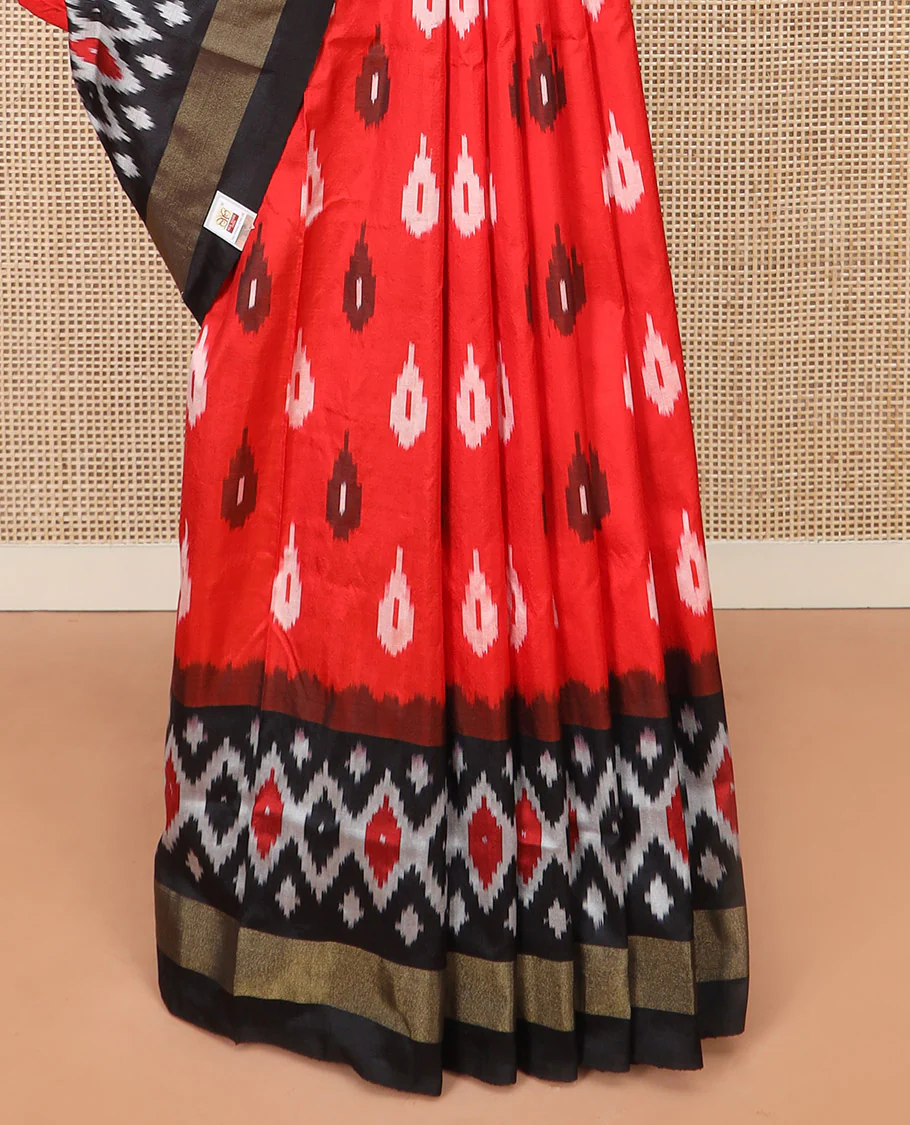 Red Ikkat Silk Saree Brightened with Ikkat Buttas, Complemented by a Contrast Ikkat Design Border, a Hazily Woven Pallu of Diamond Patterns, and a Contrast Blouse - Image 4