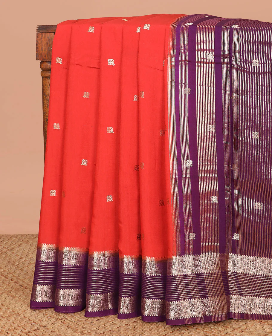 Red peacock buttas assam silk saree, contrast traditional zari border, and pallu of zari design