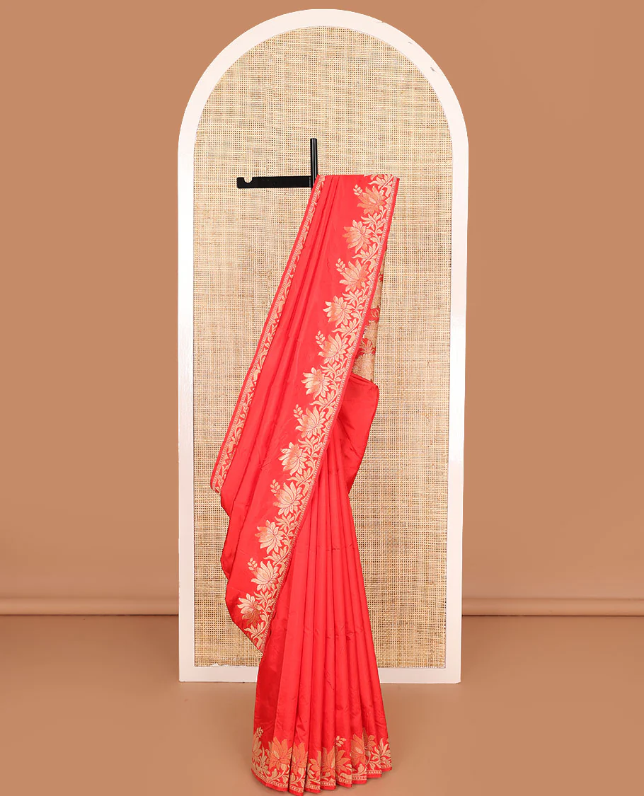 Red plain kathan silk saree, lotus floral creeper border, and lotus floral design pallu