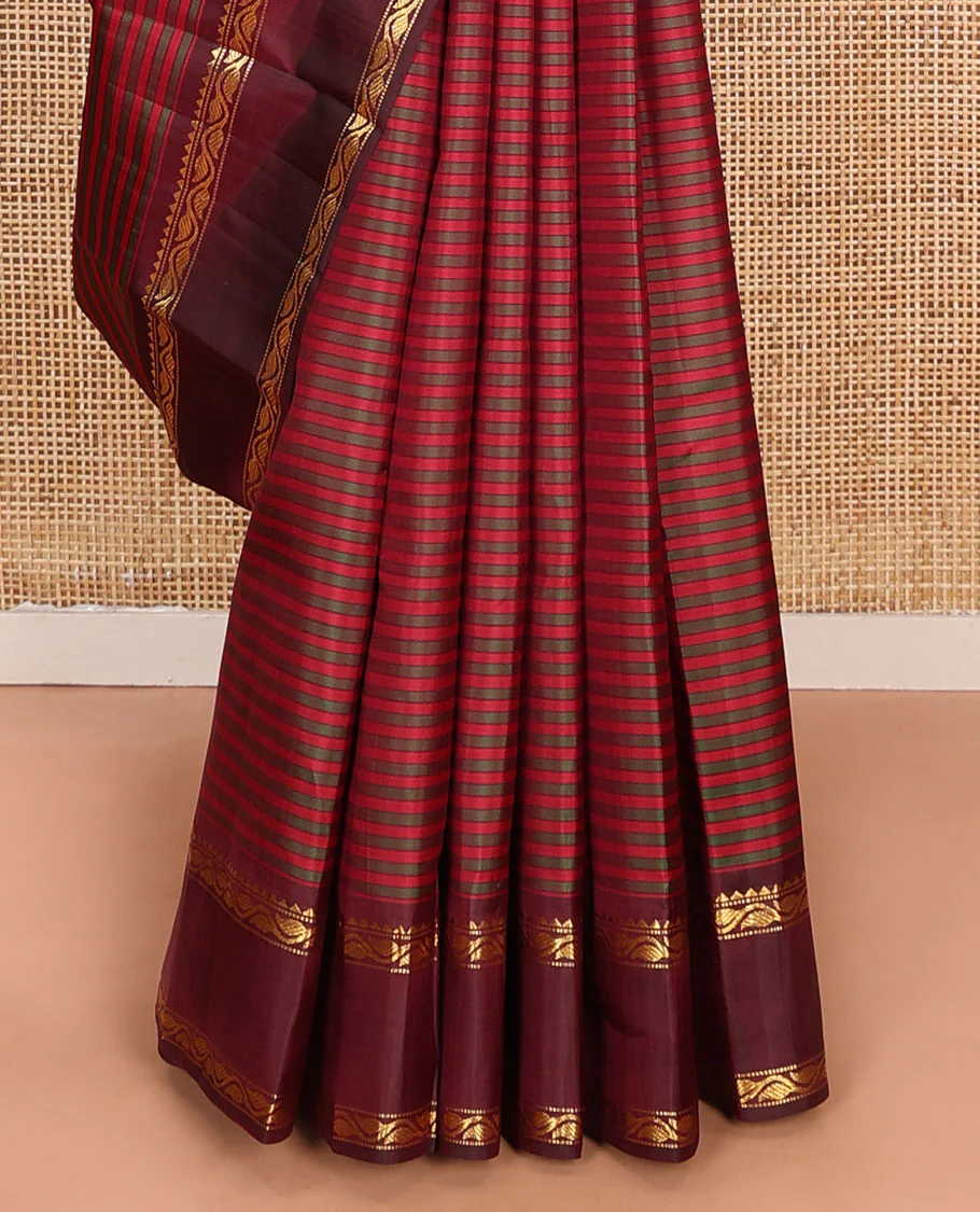 Red striped Kanchipuram silk saree, contrast rettai pettu border of rekku, muthu, and leaf creeper designs, and zari striped pallu - Image 4