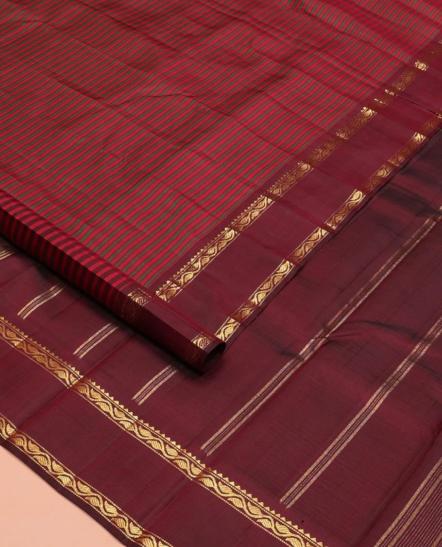 Red striped Kanchipuram silk saree, contrast rettai pettu border of rekku, muthu, and leaf creeper designs, and zari striped pallu - Image 5