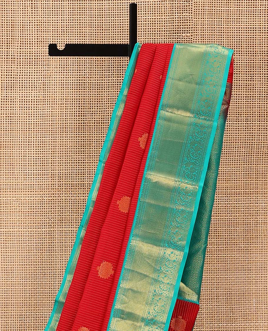 Red Vasundhara Lite Silk Mix Saree Gracefully Embellished with Zari Buttas and Stripes, Complemented with a Contrast Border Featuring Rekku, Banaras, Neli, Mayil Kann, Kodi Visiry, and Mayil Designs, Intricately Decked Up Pallu, and a Contrast Blouse - Image 3