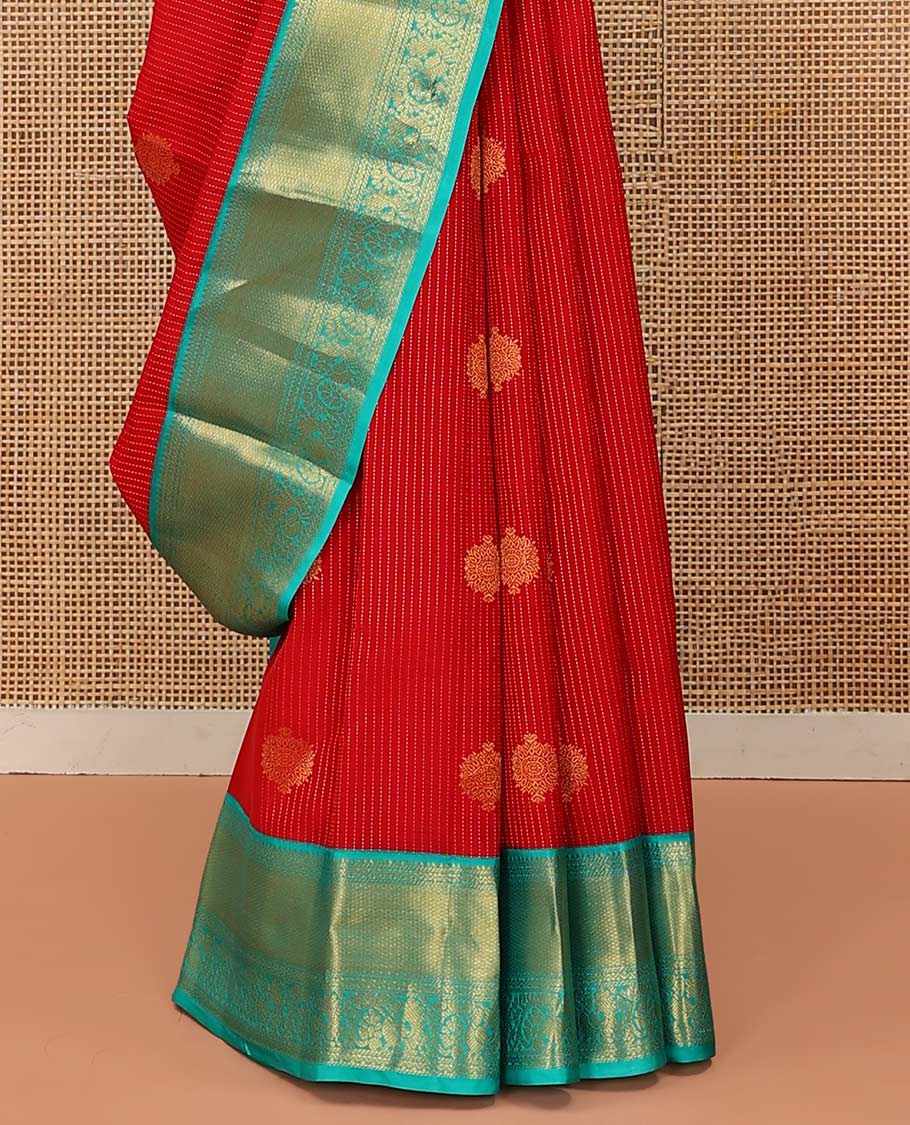 Red Vasundhara Lite Silk Mix Saree Gracefully Embellished with Zari Buttas and Stripes, Complemented with a Contrast Border Featuring Rekku, Banaras, Neli, Mayil Kann, Kodi Visiry, and Mayil Designs, Intricately Decked Up Pallu, and a Contrast Blouse - Image 4