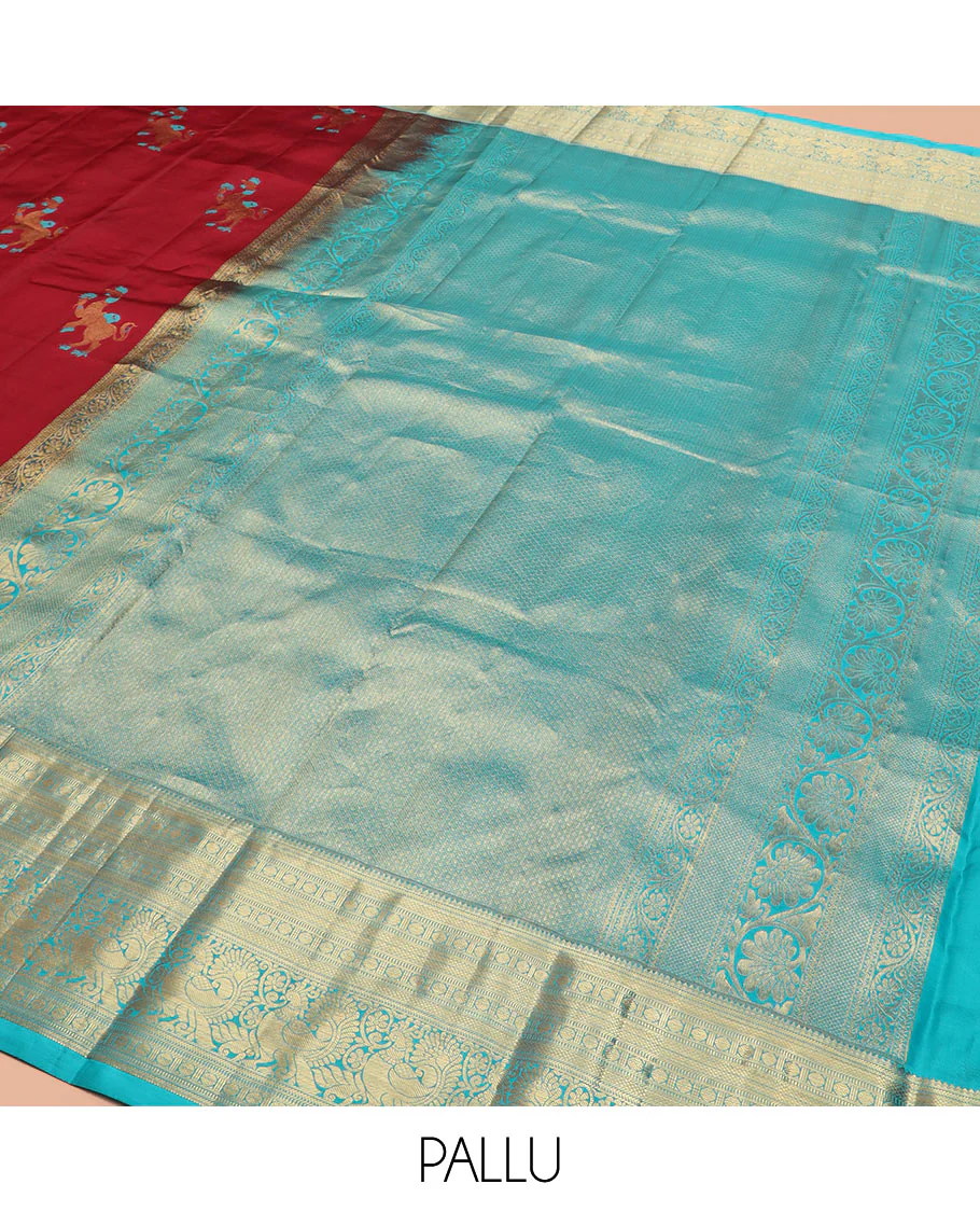Red Vasundhara Silk Saree, Traditionally Decked up with Navagunjara Buttas, Complemented by a Contrast Border of Rekku, Kathir, Rudraksham, Muthu, and Mayil Designs, Adorned with a Pallu of Jaal Design, and Paired with a Contrast Blouse - Image 5
