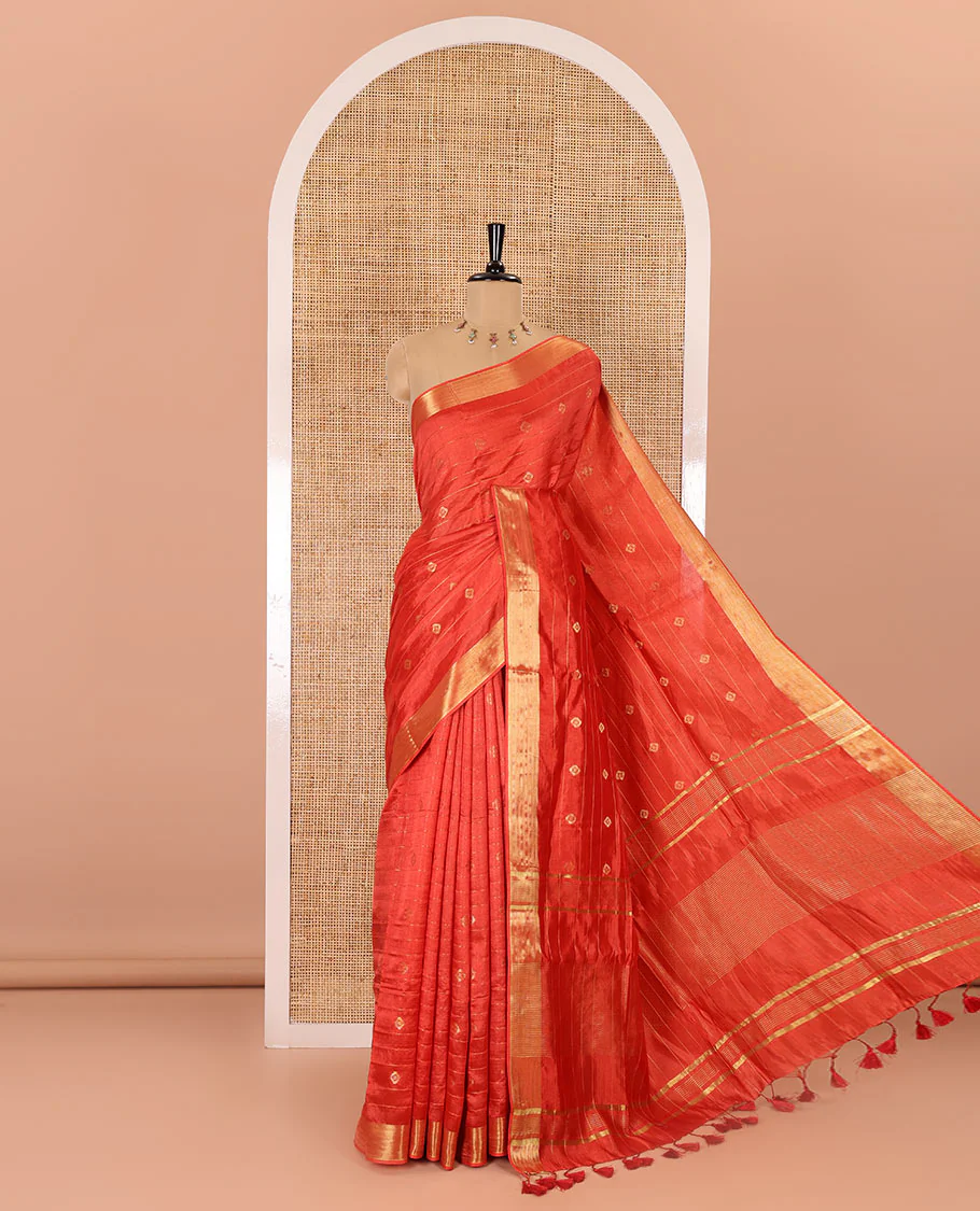 Red zari buttas and striped banana pith saree, bavanji border, zari striped pallu, and a matching blouse