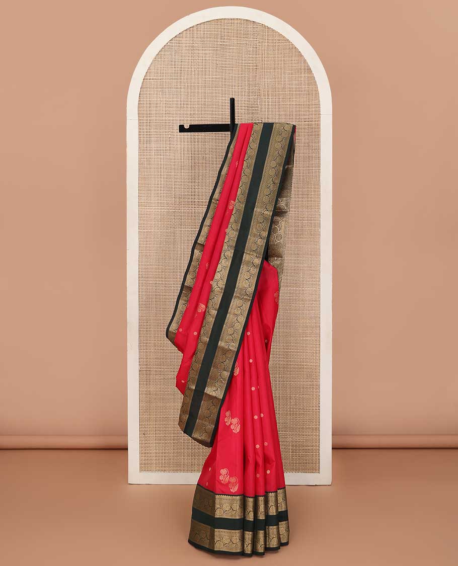 Red zari buttas Vasundhara silk saree, contrast rettai pettu border of manga, paisa and kodi visiry designs, and floral design pallu