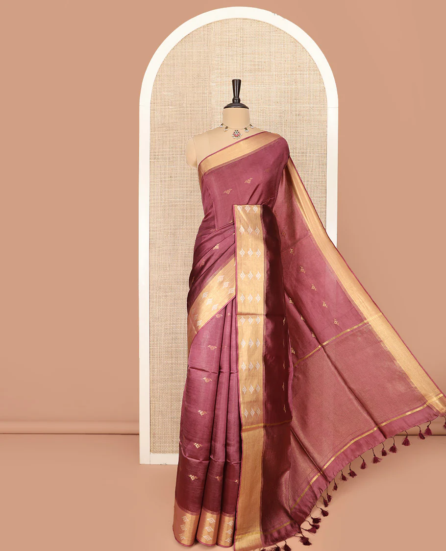 Redwood Color Banana Pith Saree Highlighted with Zari Buttas, Subtly Woven Piping Border, Pallu of Zari Stripes, and Paired with a Matching Plain Blouse
