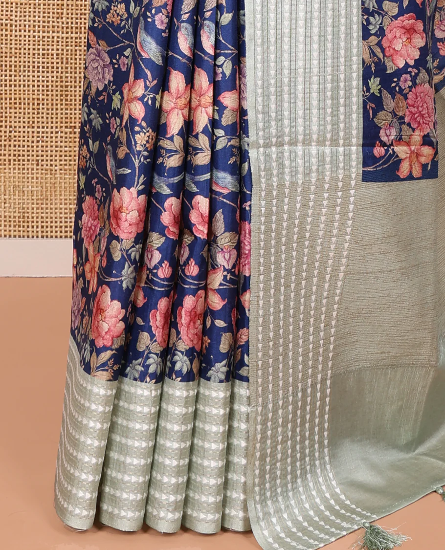 Royal blue colorful floral motifs printed fancy tussar saree, contrast triangle motifs border, striped pallu, and a contrast striped blouse - Image 3