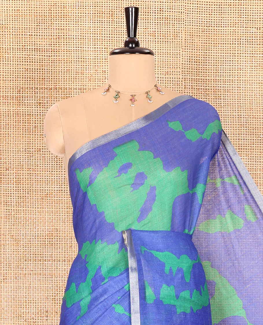 Royal blue shibori printed linen cotton saree, piping border, contrast floral printed pallu, and a contrast floral printed blouse - Image 2