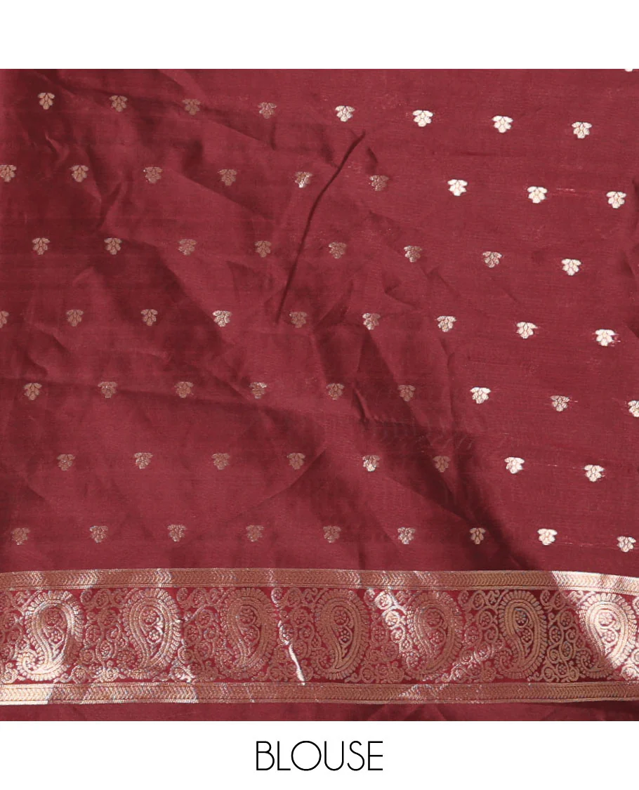 Rust Orange Kanchi Silk Saree Gracefully Embellished with Zari Buttas Woven All Over Its Body, Highlighted with a Contrast Traditional Zari Border of Paisleys, Artfully Detailed Pallu of Intricate Designs, and Paired with a Contrast Zari Design Blouse - Image 3