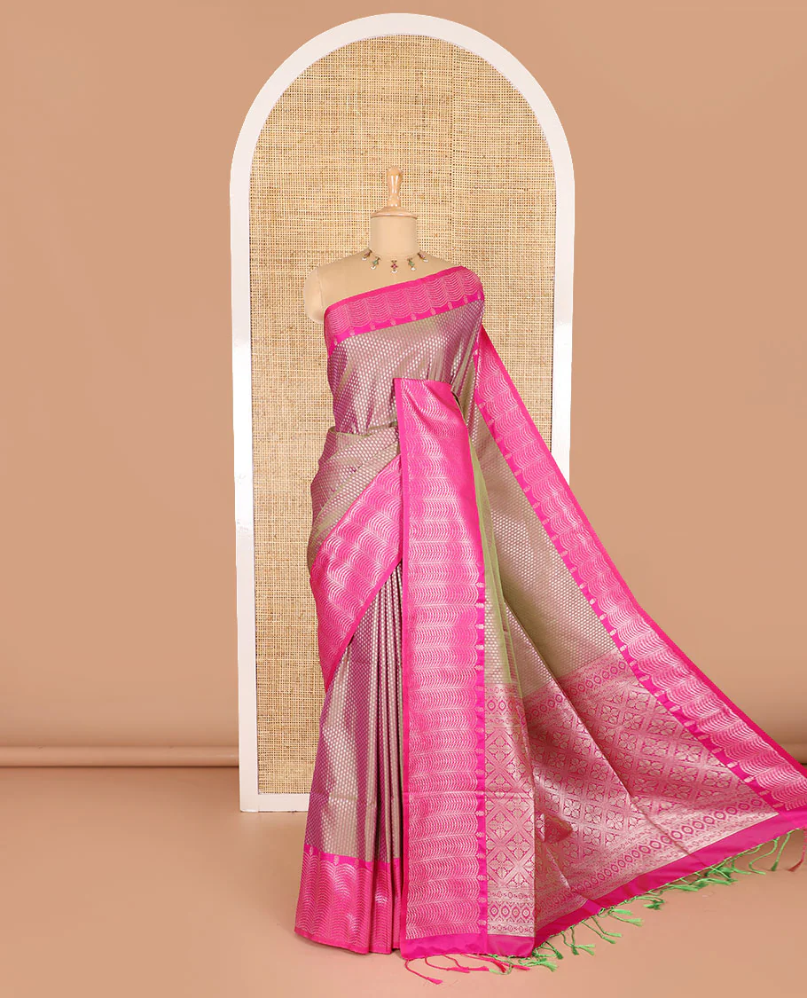 Sage green small zari buttas woven elite soft silk saree, contrast zari woven scallop satin border, jaal pallu, and a contrast chakram zari motifs blouse