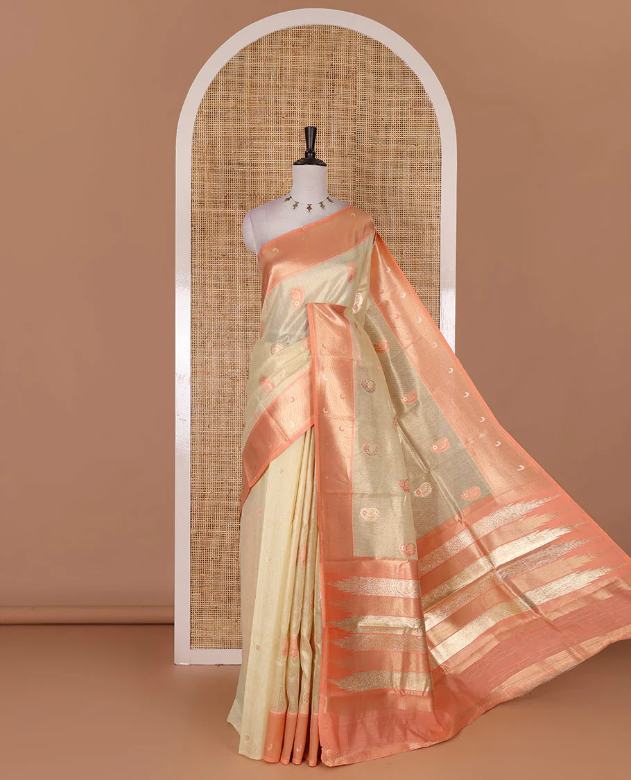 Sandal antique buttas tissue silk saree, contrast satin zari border of half-moon motifs, pallu of temple design pallu, and contrast butta blouse