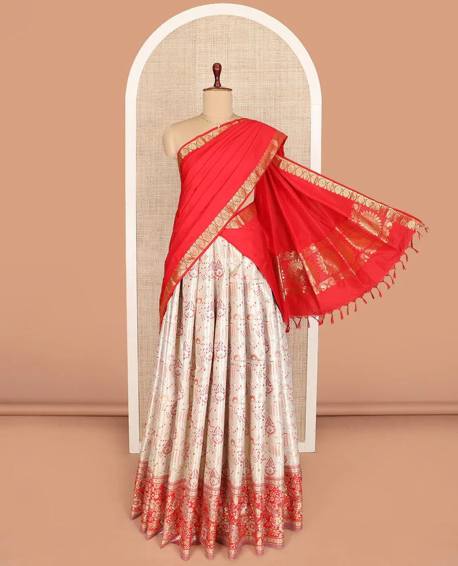 Sandal Art Silk Material Half Saree Set Featuring Jacquard Skirt, a Contrast Floral Zari Design Border, a Zari-Jacquard Blouse, and a Dhavani Graced with Zari Designs