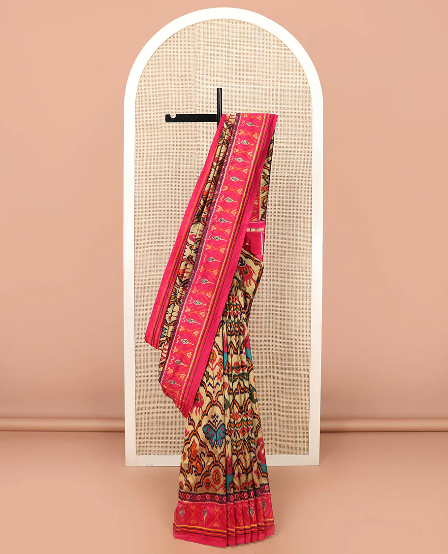 Sandal Ikkat Silk Saree Featuring Kaleidoscopic-Coloured Flora or Fauna Motifs Enclosed in Mughal Jaal, Complemented by a Contrast Ikkat Border, Adorned with a Pallu of Patola Fauna Motifs, and a Plain Contrast Blouse - Image 2