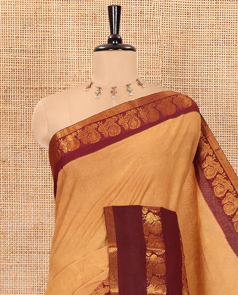 Sandal plain sungudi cotton saree with contrast traditional border of peacocks, zari striped pallu, and a contrast zari checked blouse - Image 2